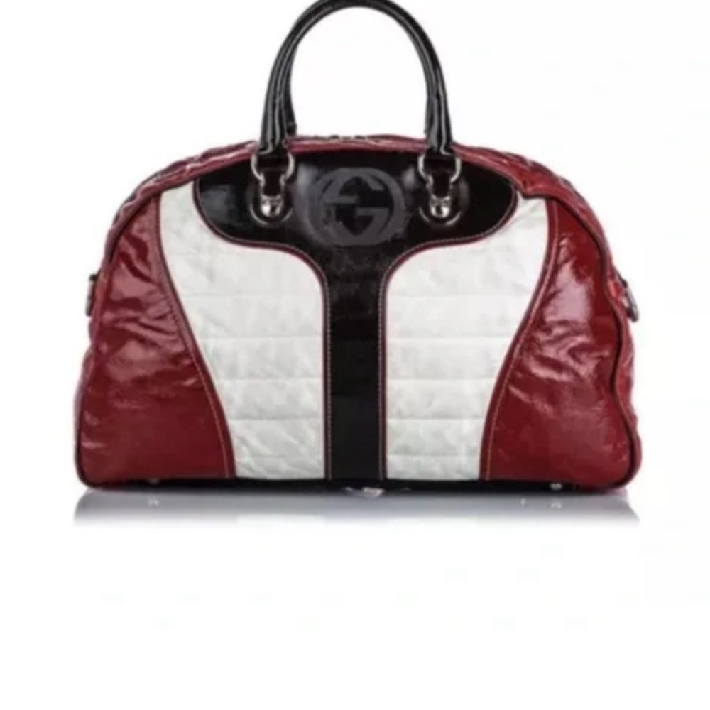 Used GUCCI OVER NIGHT CARRY ON BAG .